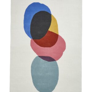 Inaluxe Transmission rectangular rug shown flat in cream with blue, pink, yellow, red, teal and dark shapes, with overlapping rounded colour blocks.