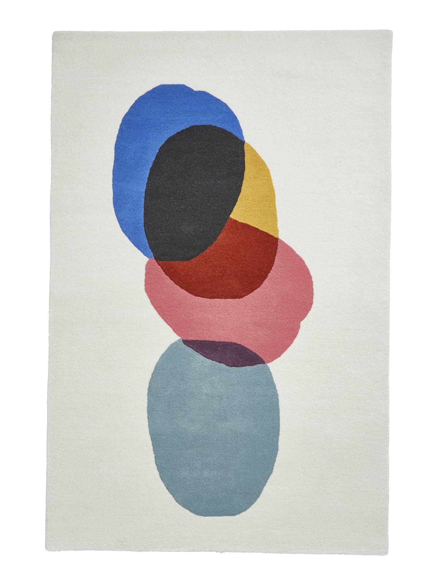 Inaluxe Transmission rectangular rug shown flat in cream with blue, pink, yellow, red, teal and dark shapes, with overlapping rounded colour blocks.
