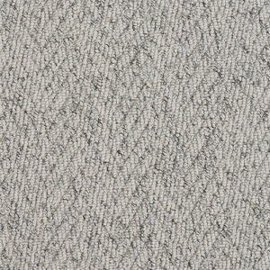 Close-up of Marlow Silver Pebble Herringbone Carpet, showing light silver-grey tones and small repeating herringbone loops.