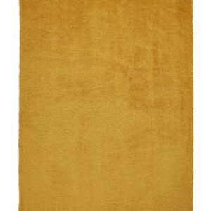 Riviera rectangular rug shown flat in ochre, with a plain shaggy surface.