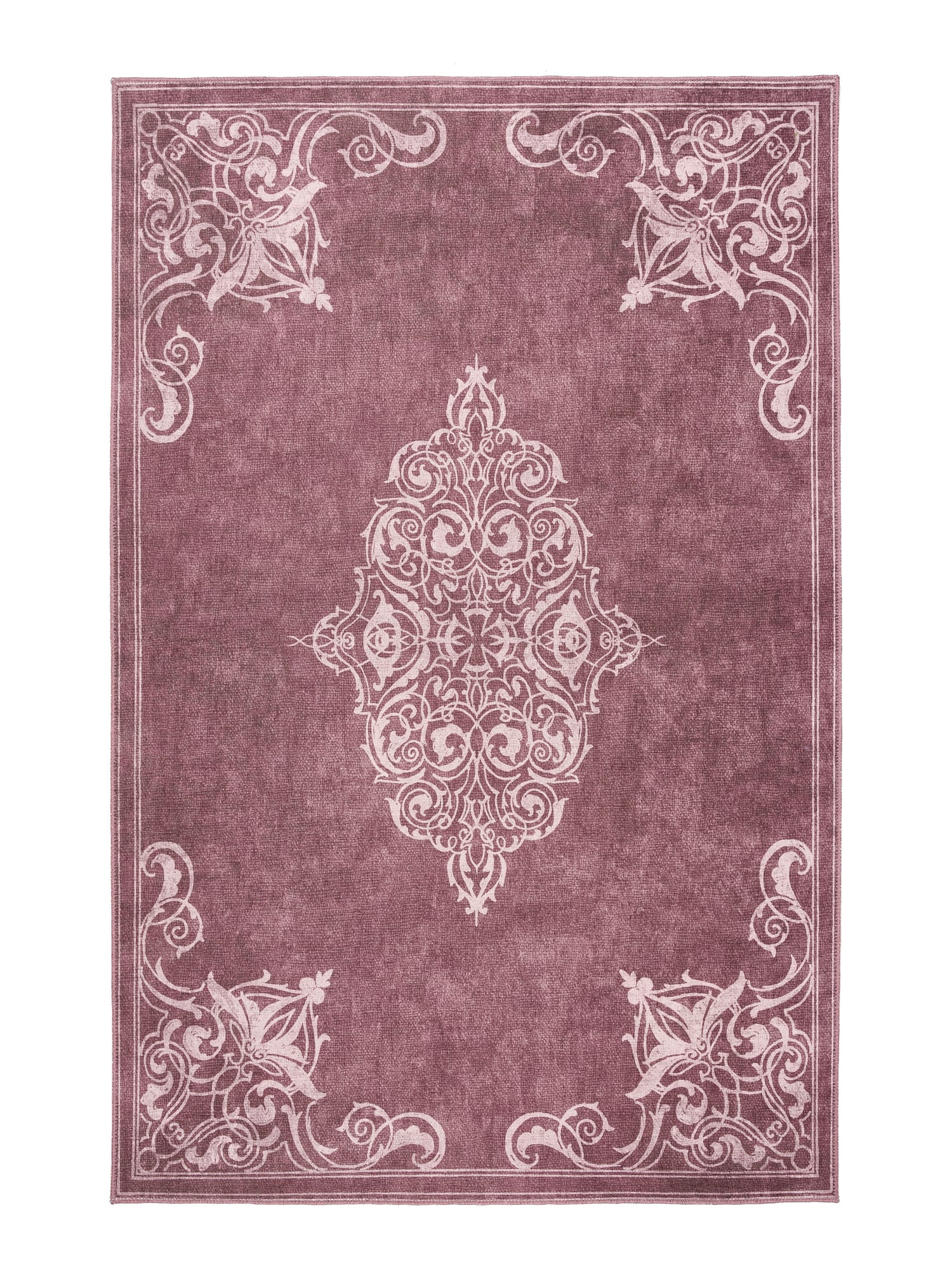 Sarabande rectangular rug shown flat in red, with a pale ornamental centre with scrolling corner motifs.