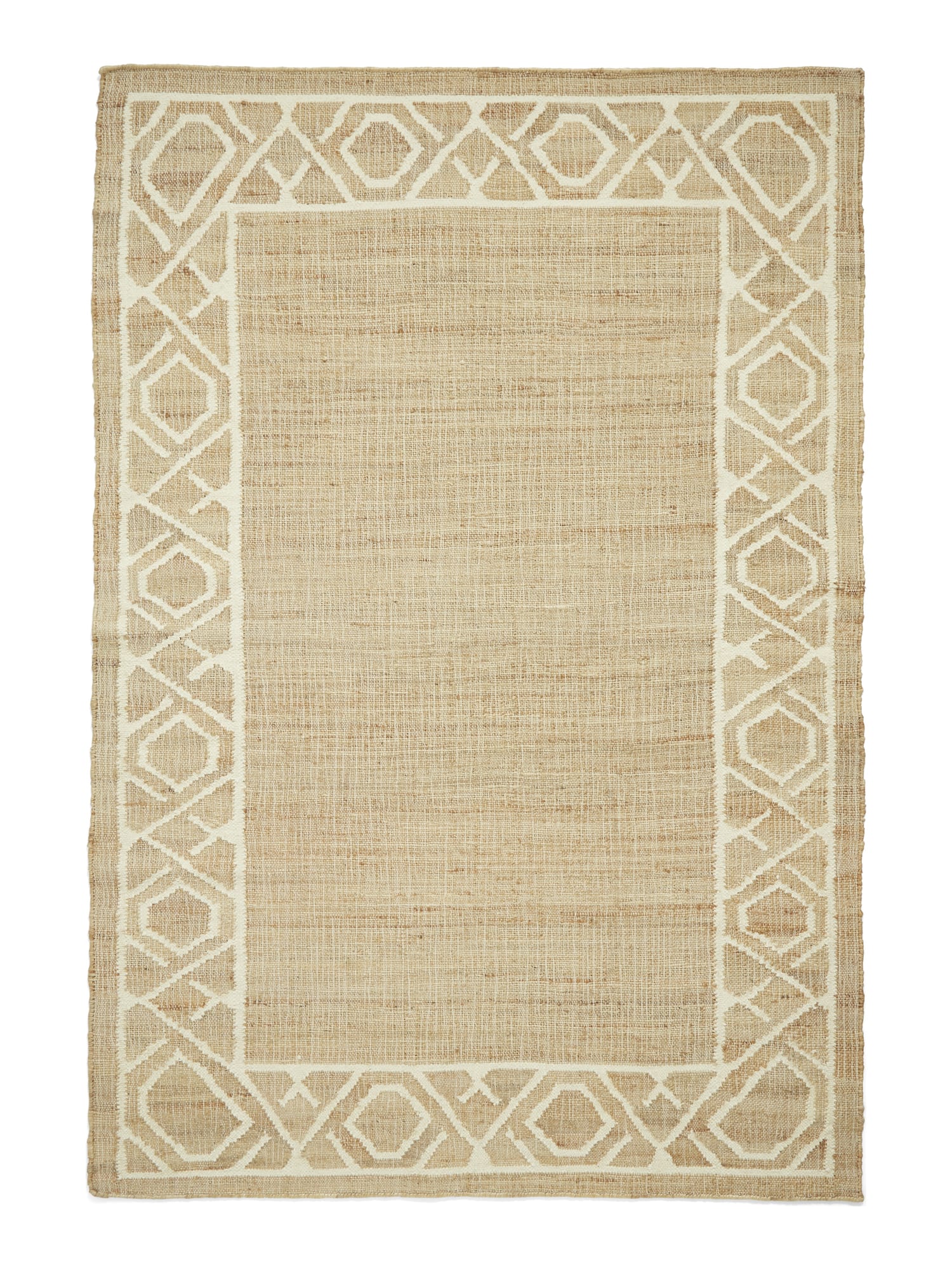 Spartan Diamond Border rectangular rug shown flat in natural and ivory, with an interlocking diamond-patterned border around a plain centre.