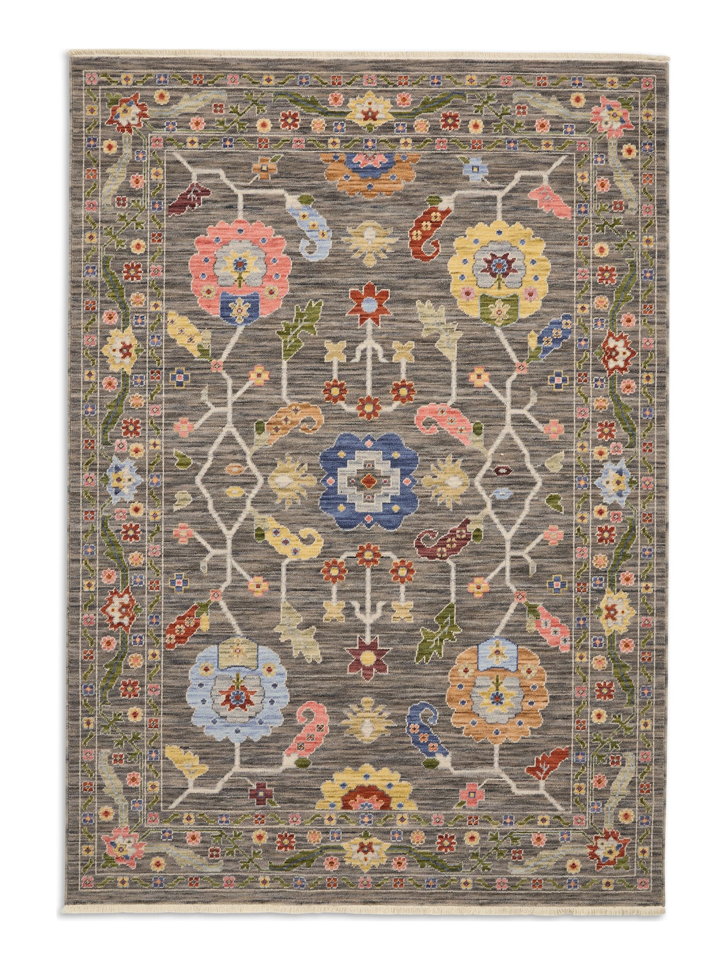 Suzani Branching Floral Black/Multi Wool-Blend Rug. Suzani Branching Floral rectangular rug shown flat in black and mixed colours, with large spaced floral motifs joined by branching lines.